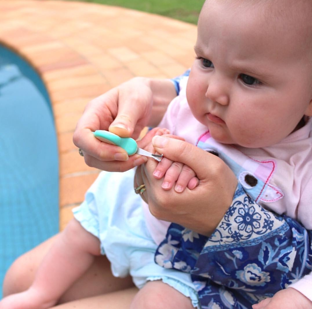 Cutting babies nails 