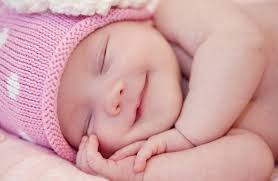 why do babies smile in their sleep but not awake